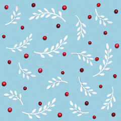 Winter seamless pattern: red cranberries with white paper crafted  twigs with leaves