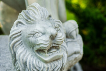 Fototapeta na wymiar White marble lion statue