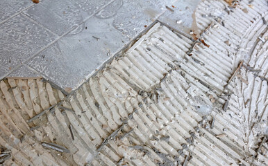 Breaking up floor tiles