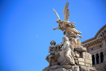 Beautiful statue on the old building and clear sky