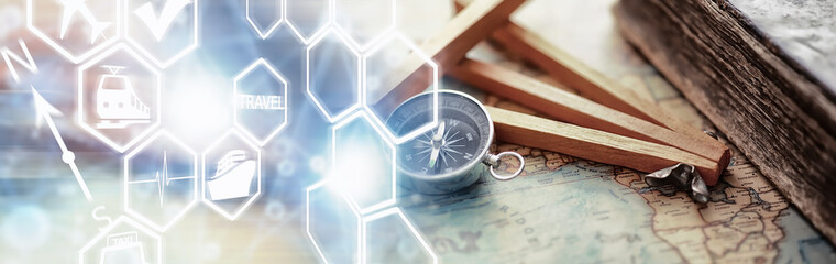 Travel and adventure search concept. Vintage aged map with a shabby book and compass. Shabby book...