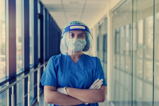 Young Pretty Nurse Wearing Face Shield Mask Protection From New Infectious Virus Coronavirus