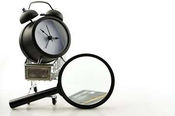 Summer sale business objects of Shopping cart with Magnifying glass ,alarm clock and credit card copy space for your text.