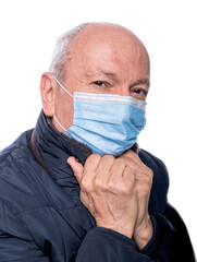 Senior man in protective mask  posing in studio over white background