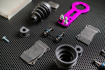 new car spare parts collection flat lay on dark background, change details service