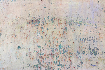 Painted metal surface with traces of rust and peeling paint.