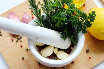 mortar filled with fresh herbs