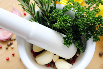 mortar filled with fresh herbs