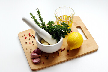 mortar filled with fresh herbs