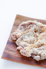 breadcrumbs and pork for Milano cutlet prepared for cooking