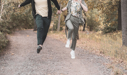 Fototapeta premium young couple lovers jump and fly, having fun, happy life