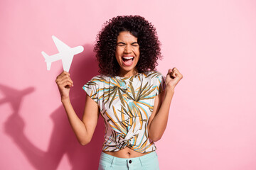 Portrait photo of crazy afraid black skinned curly girl fear of flying by plane shouting loudly...