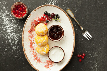 cottage cheese pancakes for Russian breakfast, Russian and Ukrainian traditional cuisine.