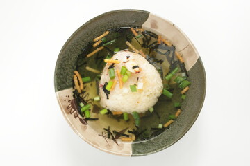 Japanese food, homemade grilled rice ball in dashi broth with spring onion