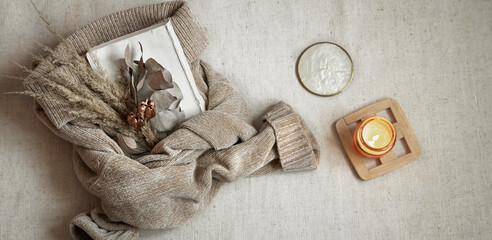 Fashion composition with women's accessories on white background with cozy home details