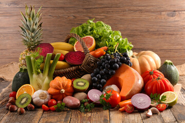 fruit and vegetable on wood background