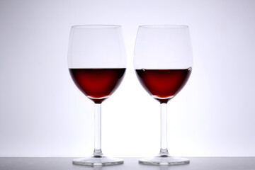 two wine glasses on white background with copy space for your text