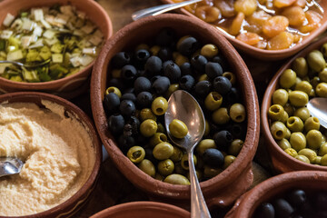 Delicious olive appetizer in countryside