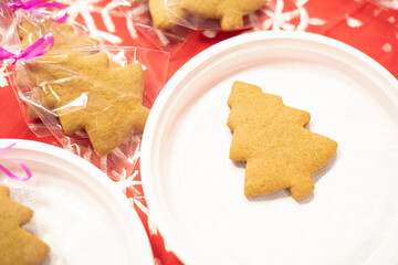 Gingerbread in the shape of Christmas tree is ready to decorate. Decorating gingerbreads, step 1. Preparing for the Christmas or New Year concept. Xmas at home concept. 