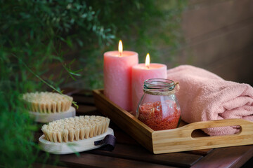 Dry massage brushes and candles. Cosmetic treatment for beauty. Natural aromatherapy. Healthy bath, body care, health care, wellness. Nature for body