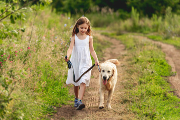 Cute little girl running with dog