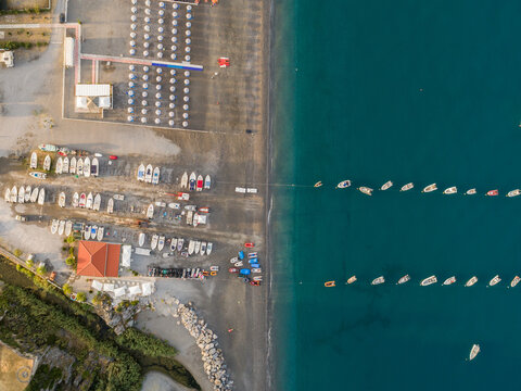 aerial vertical view of anchored boats near seashore of Scalea, Calabria, Italy.