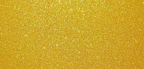 Christmas gold glitter background, golden shiny glittering shimmer pattern. Glittery sequins and...