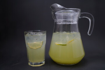 pitcher and glass of lemonade
