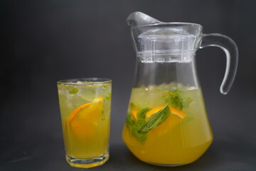 pitcher and glass of lemonade