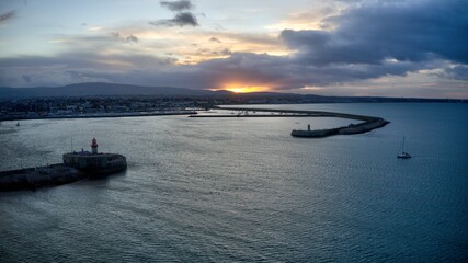 sunset over the sea, at Dun Laoghaire harbor, Dublin, Ireland