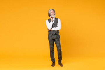 Full length of smiling elderly gray-haired business man in checkered suit waistcoat shirt put hand...