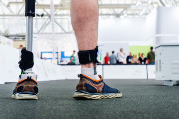 Testing the bionic leg using special sensors. Prosthetics for people with disabilities. Recovery of...