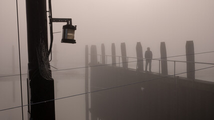 Misty morning at the harbor of Schiermonnikoog in the Netherlands