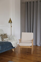 armchair and floor lamp for reading in a room with luxury decor
