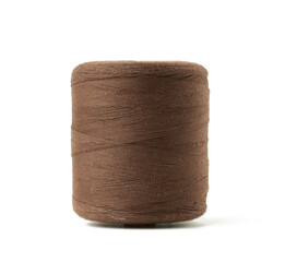 large spool with brown cotton thread isolated on white background