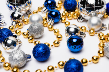 blue, silver and golden Christmas decoration on white background