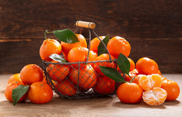 Fresh mandarin oranges fruit or tangerines in a basket