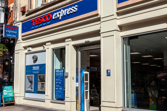 Cardiff, Wales, UK, September 14, 2016 : Tesco Express supermarket logo advertising sign at a retail business store in the city centre stock photo image