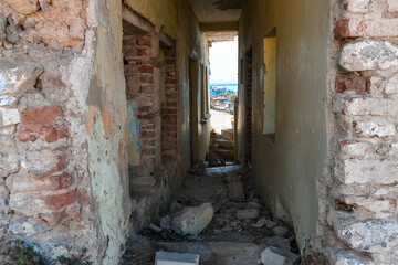 view through the corridor of a ruined house