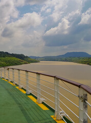 Modern Celebrity cruiseship or cruise ship liner on Chagres River during transit of Panama Canal...