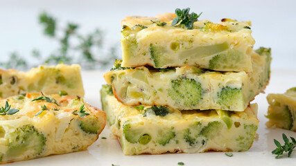 Homemade frittata with broccoli, cheese and peas.