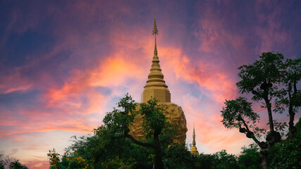 Beautiful pagoda with near dark sky in Thailand.