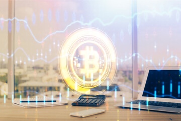 Double exposure of blockchain theme hologram and table with computer background. Concept of bitcoin...