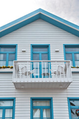 Tradittional fishermen's colorful houses in Costa Nova, Aveiro, Portugal. Tourism atraction. Blue  stripes. Detail of window.