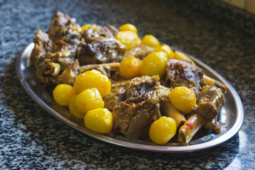 Meat and potato stew on a tray