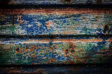 Old rusty blue fence made of metal