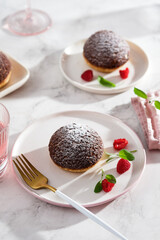French traditional Choux pastry ball. Choux with currant filling and chantilly cream.