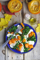 Autumn pumpkin salad with mozzarella. Healthy food. Autumn mood.