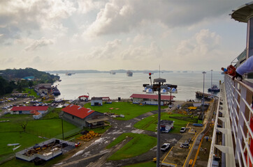 Modern Celebrity cruiseship or cruise ship liner on Chagres River during transit of Panama Canal...