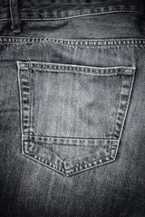 Back pocket on old worn jeans for background